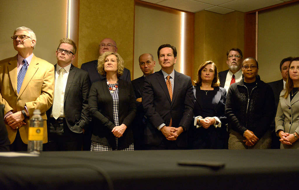 People listen at the Middleton news conference